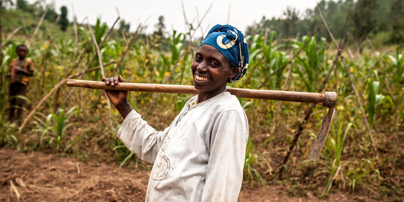 Valerie Mukangerero (53 yrs) walks to her pineapple farm in Rwamurema village, Eastern Rwanda, Kirehe District. Credit: Aurelie Marrier d'Unienville / Oxfam Valerie Mukangerero (53 yrs) walks to her pineapple farm in Rwamurema village, Eastern Rwanda, Kirehe District. Credit: Aurelie Marrier d'Unienville / Oxfam